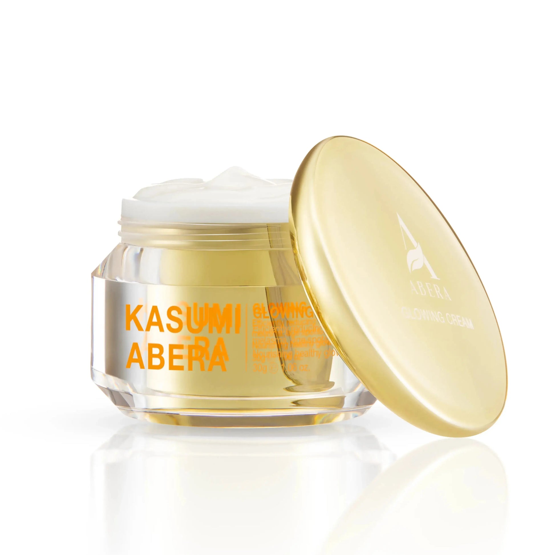 Cosmetic jar with gold lid and 'Kasumi Abera' text on a white background